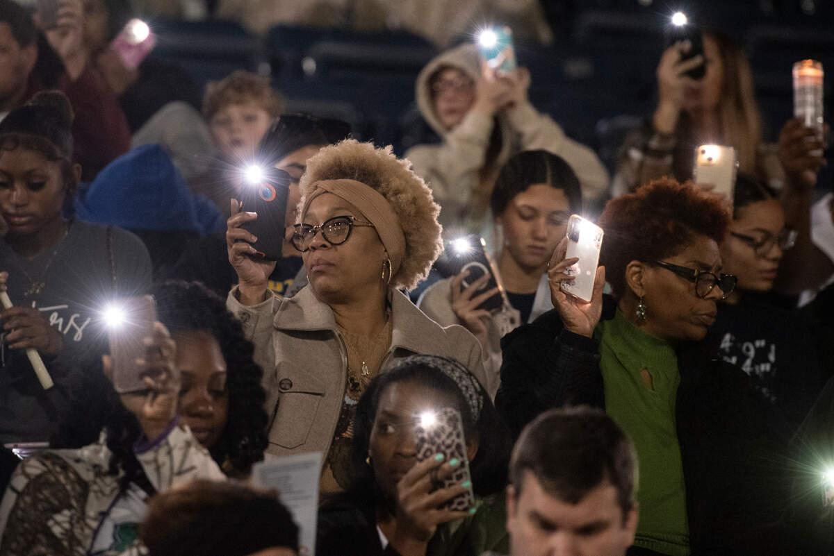 Family, friends and community members attend a candlelight vigil in honor of three Gautier High School graduates at Gautier High School in Gautier on Thursday, Dec. 7, 2023. Se’Dhari Saniya Watson-Person, Kyla “Muffin” Watkins, and Tatyanna Richmond were involved in a fatal crash on Tuesday, leading to the deaths of Watson-Person and Watkins. Richmond remains hospitalized.