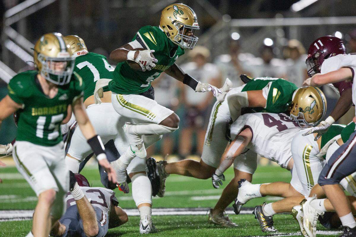 Poplarville’s Ty Keys runs the ball up the field during a playoff game against Forrest County Agricultural High School at Poplarville High School in Poplarville on Friday, Nov. 10, 2023.