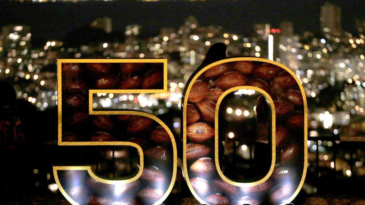 CHARLIE RIEDEL/ASSOCIATED PRESSA Super Bowl 50 sign stands in a park overlooking San Francisco Wednesday. Billions will be bet -- most of it illegally -- on every aspect of the NFL Super Bowl game between the Denver Broncos and Carolina Panthers.
