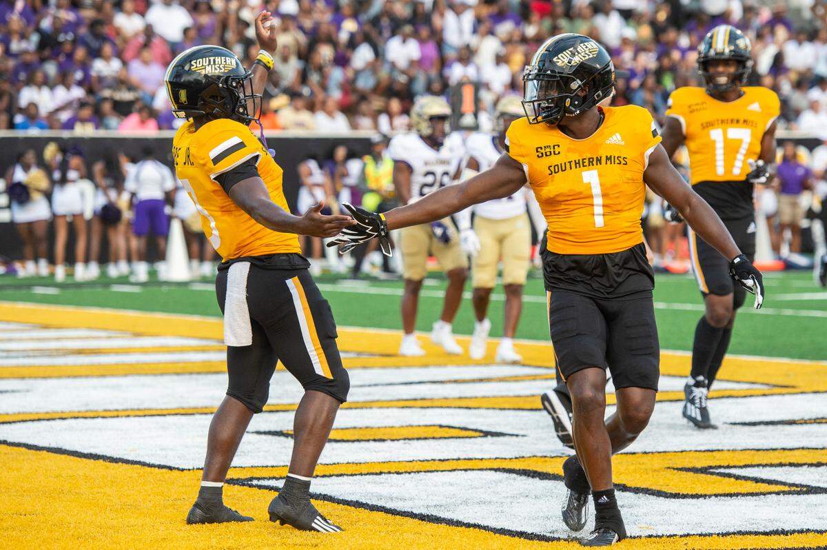 Southern Miss Golden Eagles wide receiver Jakarius Caston (1) and Southern Miss Golden Eagles running back Frank Gore Jr. (3) celebrate after a touchdown during a Southern Miss game at M.M. Roberts Stadium in Hattiesburg on Saturday, Sept. 2, 2023.
