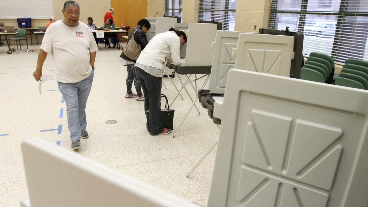 JOHN FITZHUGH/SUN HERALD 
 Joe Ford of Biloxi walks to a voting booth at the Donal Snyder Community Center in Biloxi to cast his ballot in the presidential primaries on Tuesday March 8, 2016.