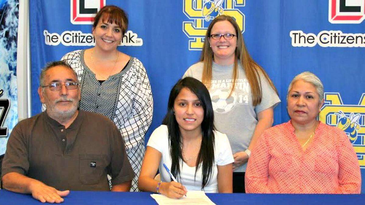 ST. MARTIN HIGH SCHOOL 
 St. Martin soccer standout Josselyn Hernandez signed with Southwest Community College. In the photo (L-R) are Elias Segura, Josselyn Hernandez, and Benita Segura.