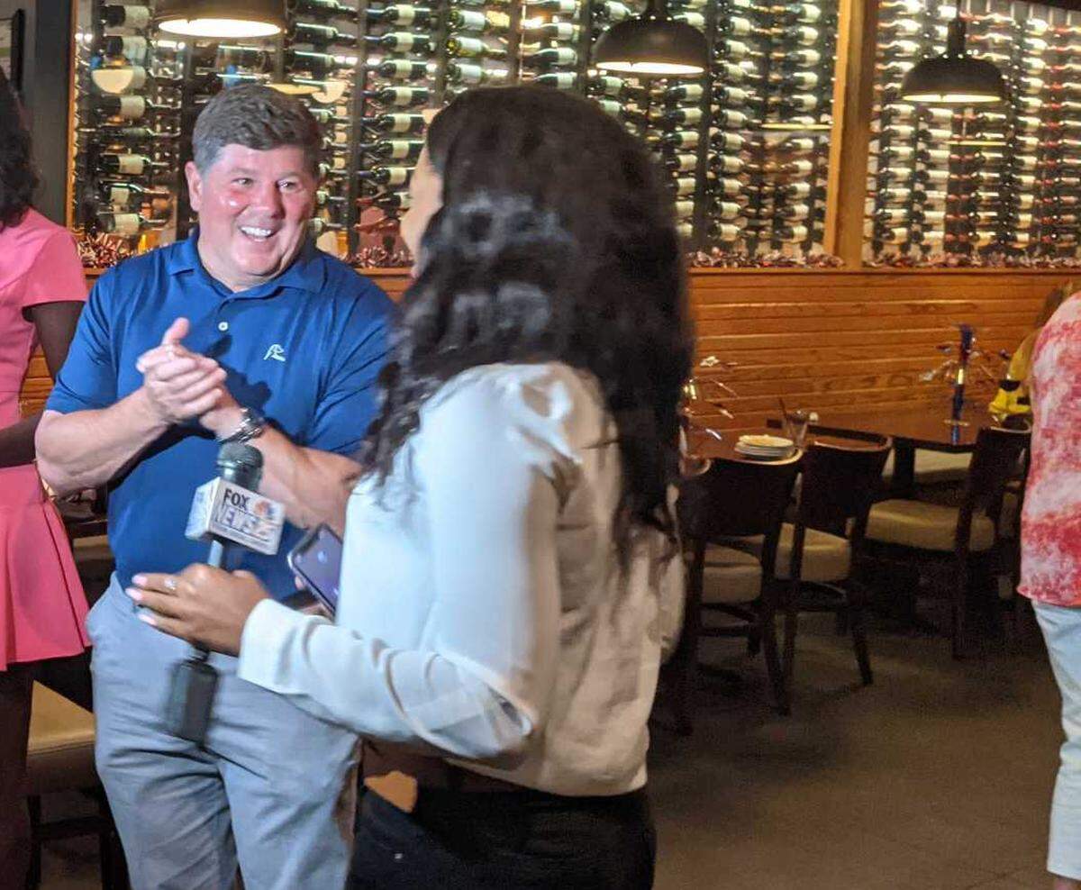 Steven Palazzo speaks to media at Patio 44 in Gulfport, Mississippi, just before the Associated Press declared Jackson County Sheriff Mike Ezell the winner in the runoff election, clenching the Republican nomination for U.S. Congress seat.