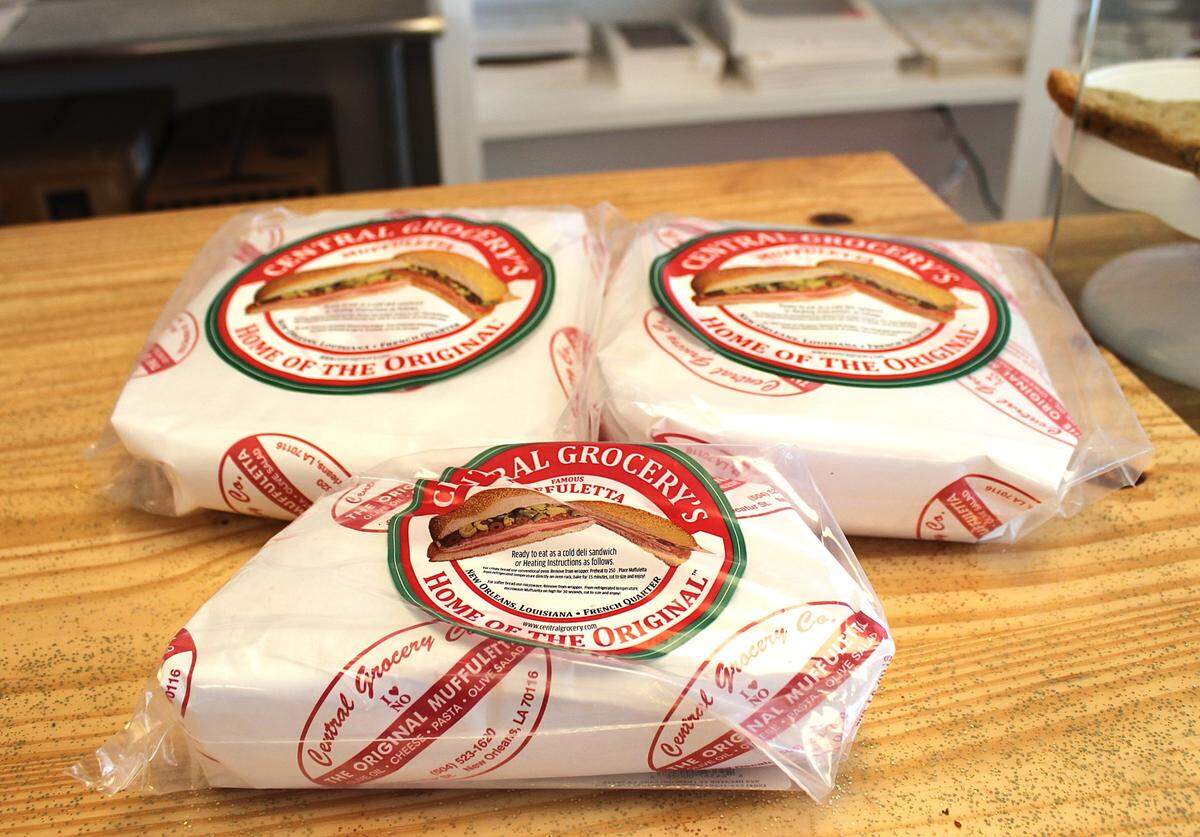Famed New Orleans deli Central Grocery is credited with creating the first muffaetta in 1906, a sandwich known for its homemade olive salad and sesame-studded loaf.