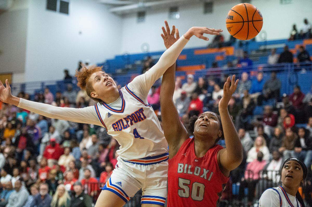Biloxi’s Zaniya Johnson tries to get the ball as Gulfport’s Micah O’Dell blocks her shot during a game against Gulfport at Gulfport High School on Friday, Jan. 13, 2023.