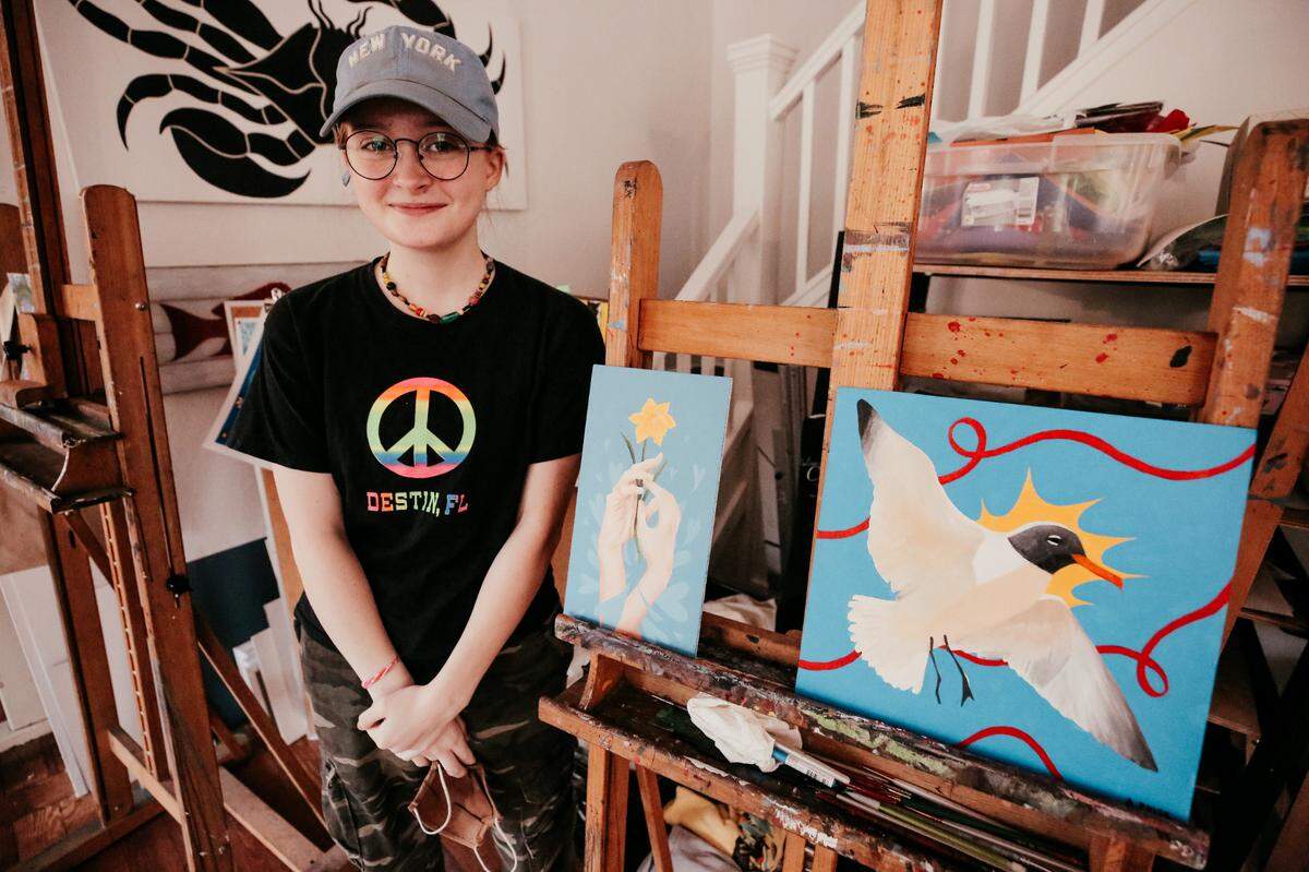 Ava Prisk, a junior at Ocean Springs High School, with some of the art she worked on as part of the residency sponsored by the Friends of Art, Culture and Education in Ocean Springs. Their art is on display at the Ohr-O’Keefe through May 1, 2021.