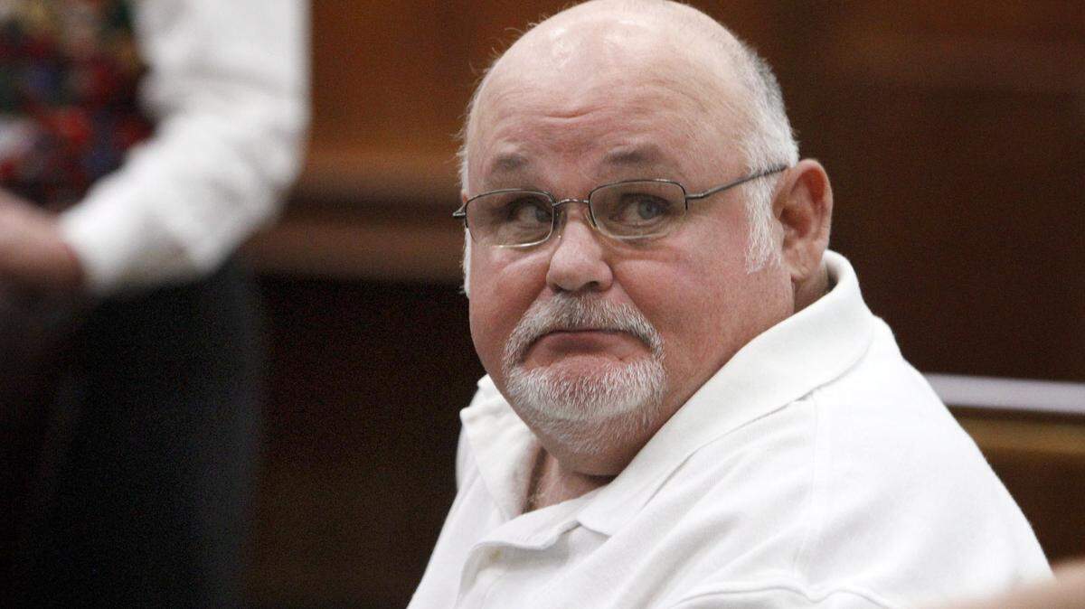 TIM ISBELL/SUN HERALD 
 Maury Thompson awaits the ruling of Judge Neil Harris in SRHS case, Tuesday, Dec. 23, 2014, in Pascagoula.