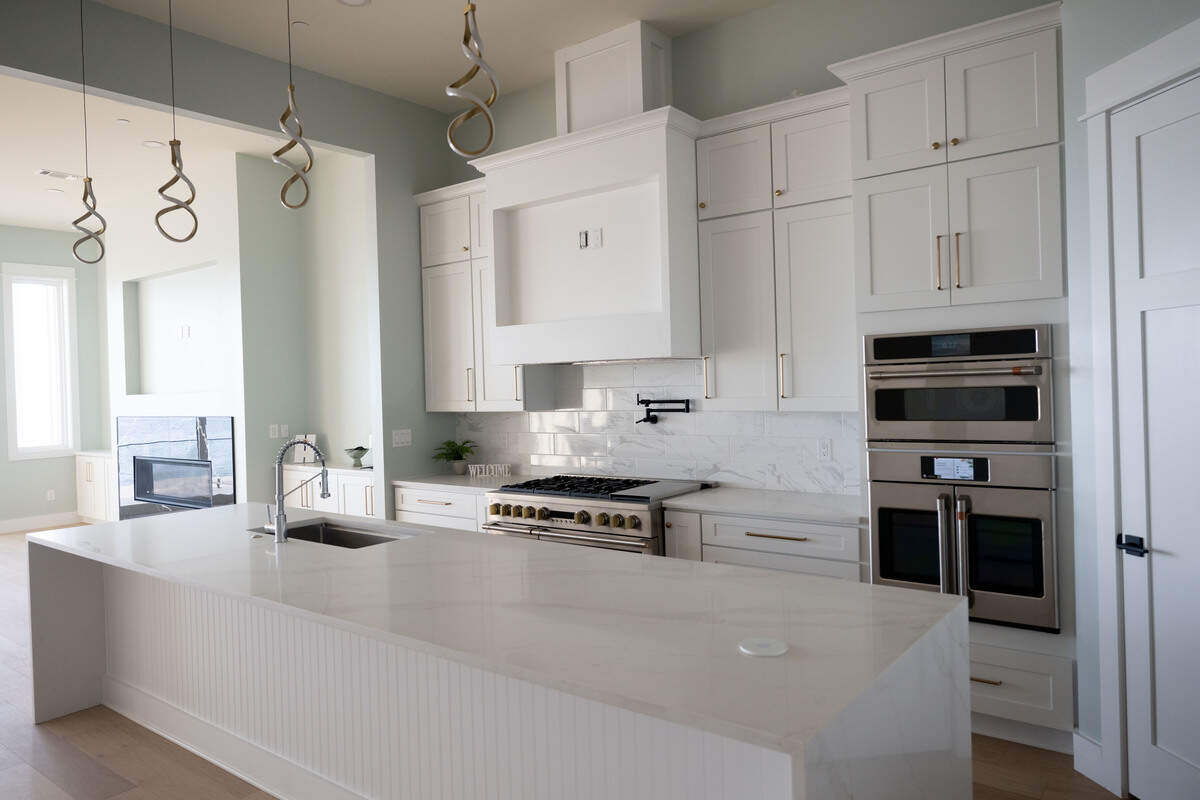 A three-story home overlooking the Mississippi Sound in Biloxi includes an open-concept kitchen and living area with 12-foot ceilings. The photograph was taken on Tuesday, February. 3, 2026.