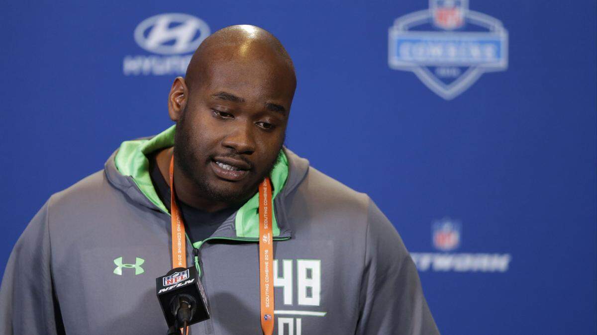 FILE - In this Feb. 24, 2016 file photo, Mississippi offensive lineman Laremy Tunsil speaks during a press conference at the NFL football scouting combine in Indianapolis. Former Mississippi left tackle Laremy Tunsil had a good chance to be the NFL draft's No. 1 overall pick less than two weeks ago when the Tennessee Titans had the pick. Then the Los Angeles Rams traded up for the No. 1 pick in search of a quarterback. Now Tunsil's future is much more uncertain. (AP Photo/Michael Conroy, File)