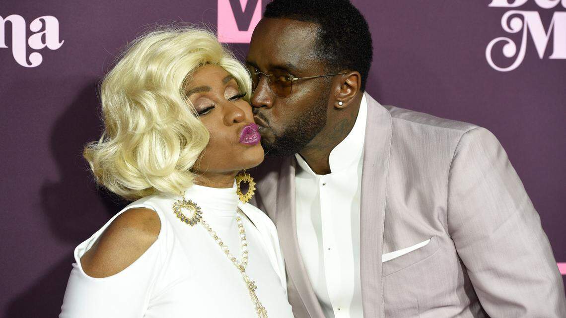 Sean Combs, right, kisses his mother Janice Combs as they arrive at the 3rd annual “Dear Mama: A Love Letter to Moms” at The Theatre at Ace Hotel on May 3, 2018. This week, the rapper threw his mother an 80th birthday bash and gifted her a new Bentley. (Photo by Chris Pizzello/Invision/AP)