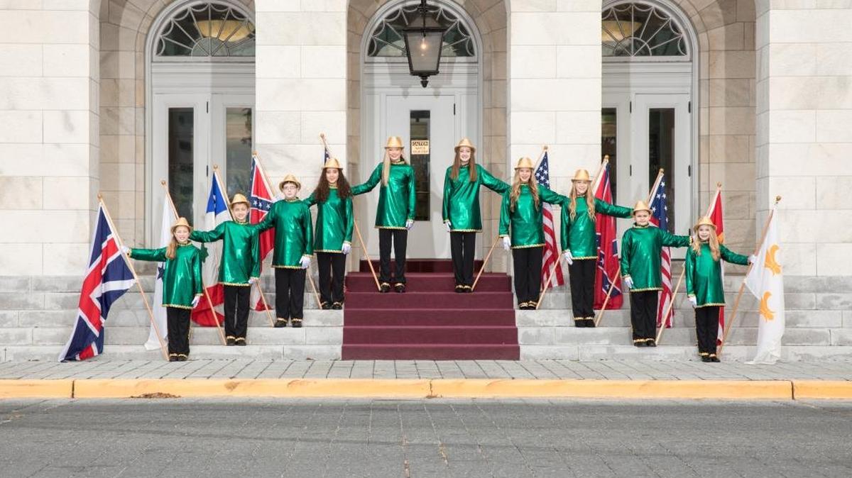 Gulf Coast Carnival Association flag bearers are, from left, Emma Riemann, Reed Fairley, Zachary Lyons, Mia Carter, Olivia Plummer, Reagan Fairley, McKay Dockery, Maren Kate Nadolski, Ezra Hopkins and Natalie Hulett.