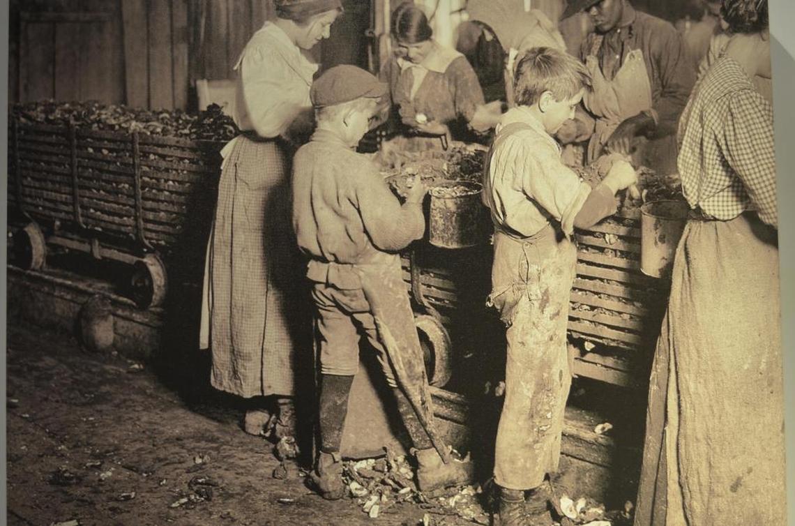 This photograph by Lewis Hine was taken in 1911 at the Dunbar, Lopez, Dukate Co. in Biloxi.