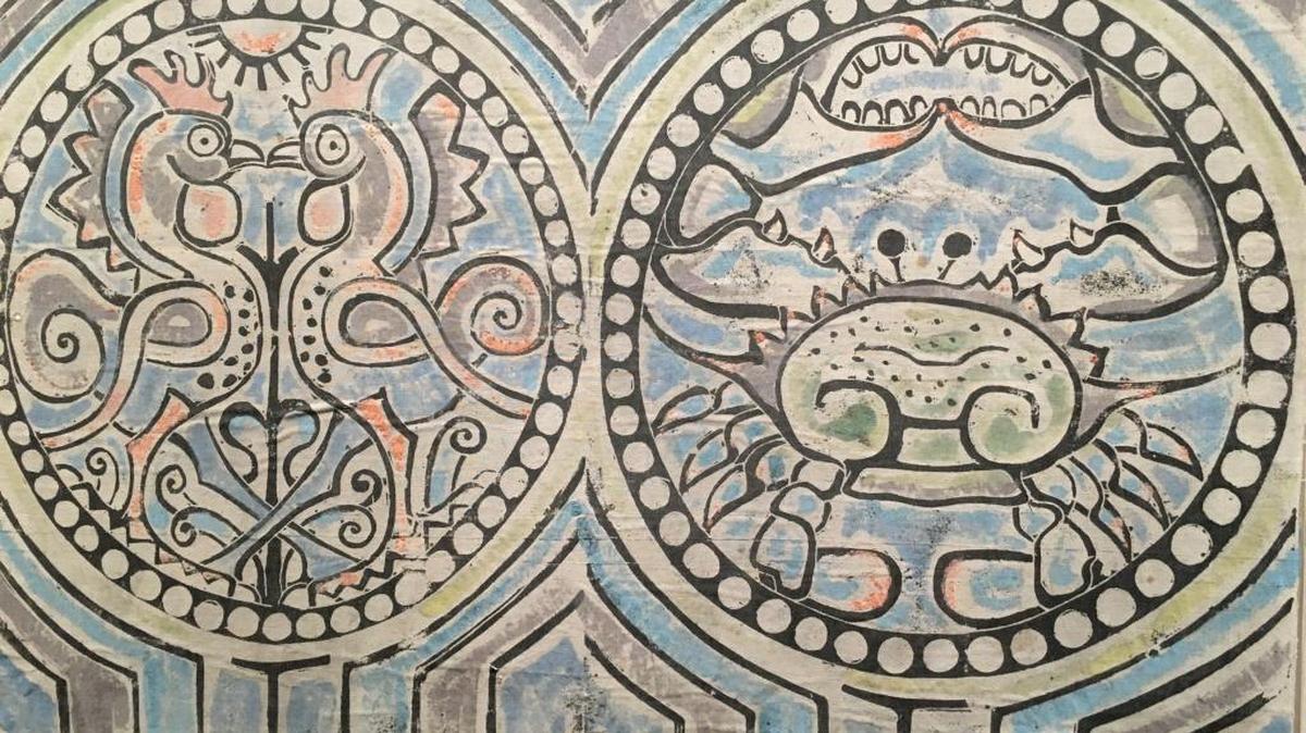 ‘Medallion Wall Hanging,’ printed and painted by Walter Anderson, is a linoleum block print on linen from around 1945. It is part of the ‘Atomic Alternatives’ exhibition at the Walter Anderson Museum of Art in Ocean Springs.