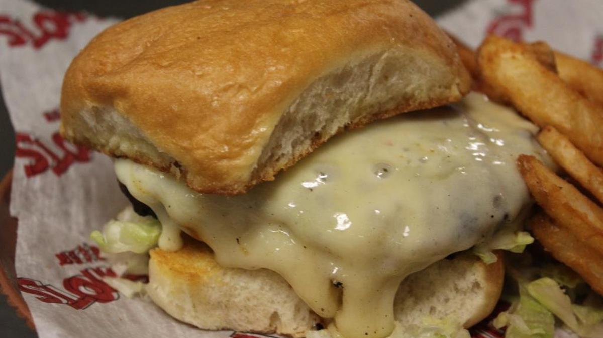 This delicious burger was made at In and Out Breakfast, Pass Road in Biloxi.
