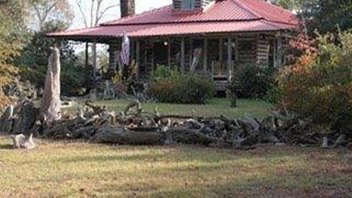 The Batson Log House is on the Garden Gate Garden Club Christmas Tour of Homes.