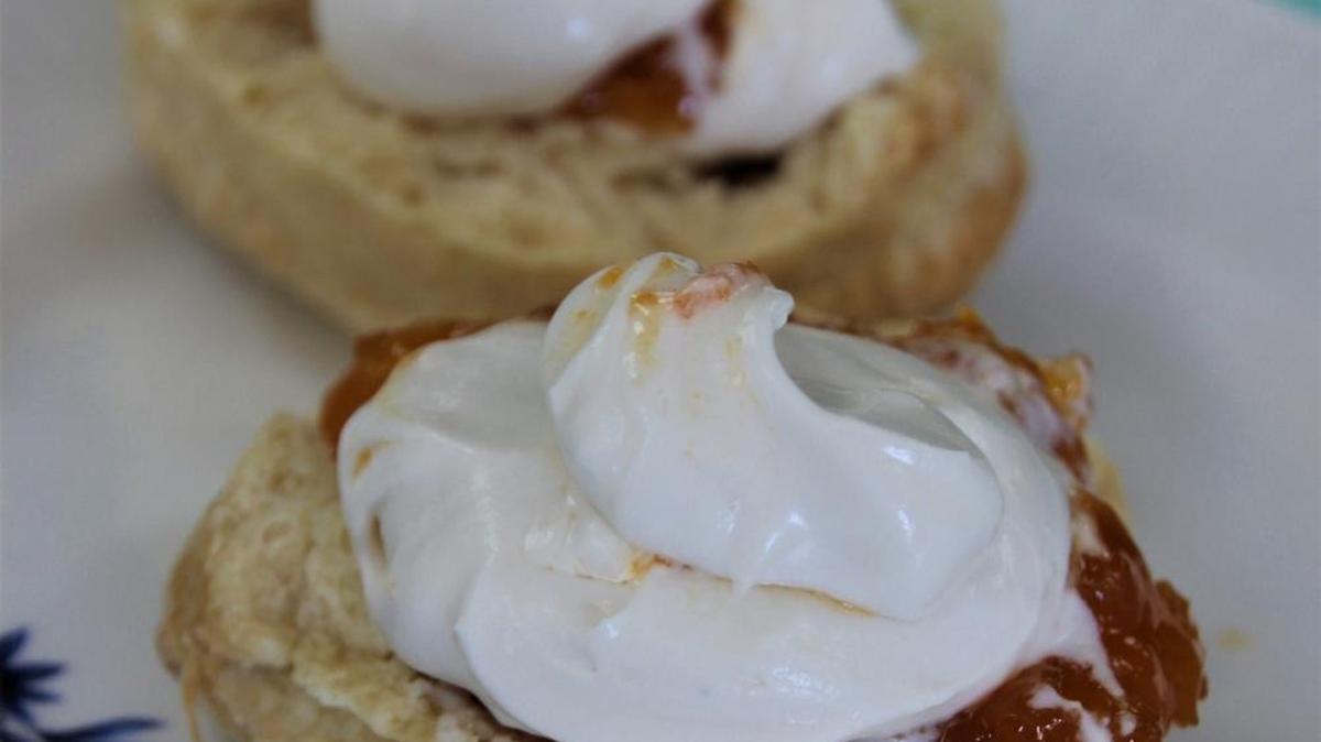 The scone with clotted cream and jam is a classic tea offering.