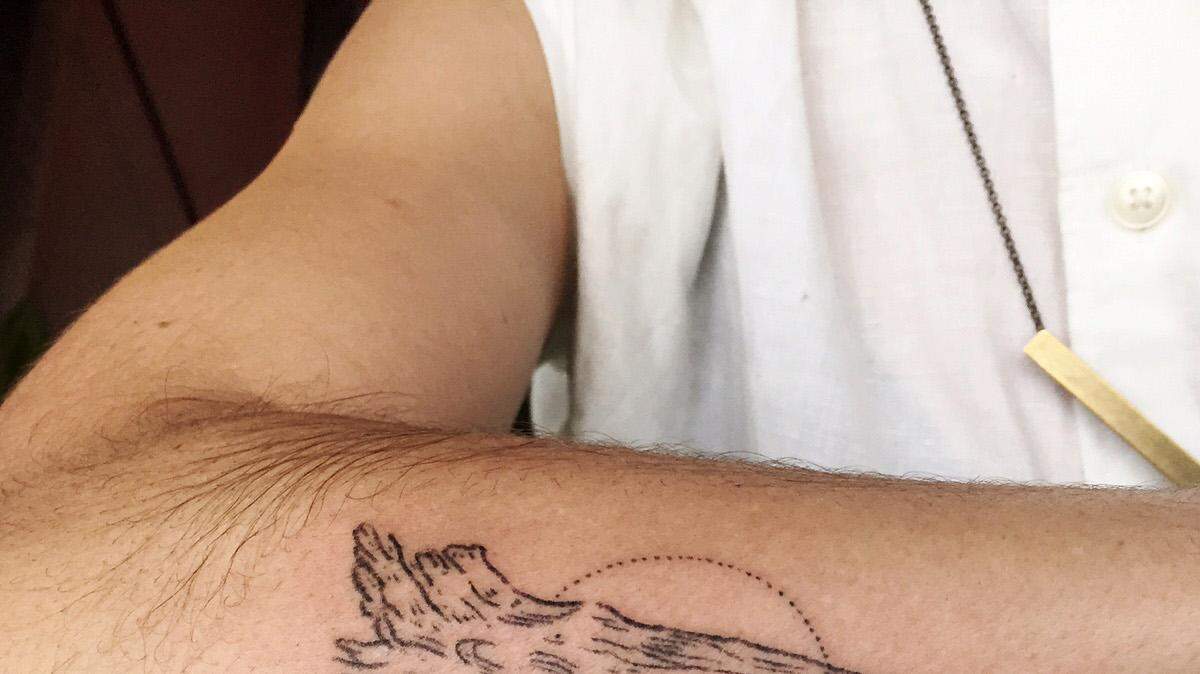 An example of a stick and poke tattoo.