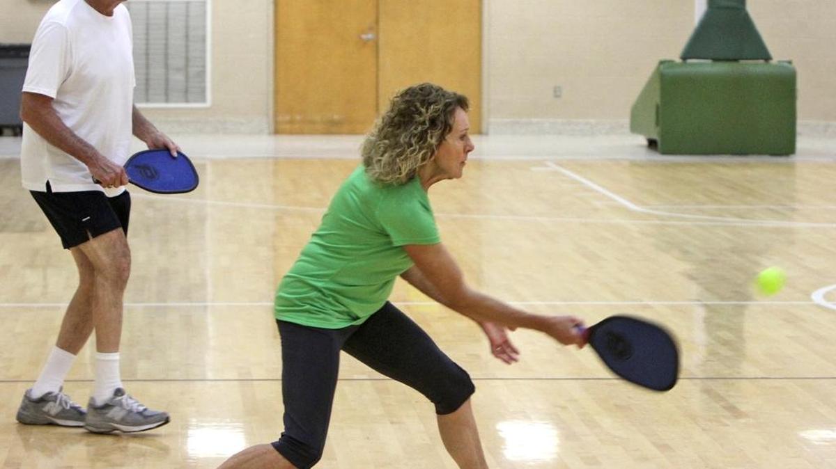 Deonne, 65, and Tom, 69, Linenberger of Biloxi play pickleball at the Donal Snyder Community Center in Biloxi on June 15, 2015.