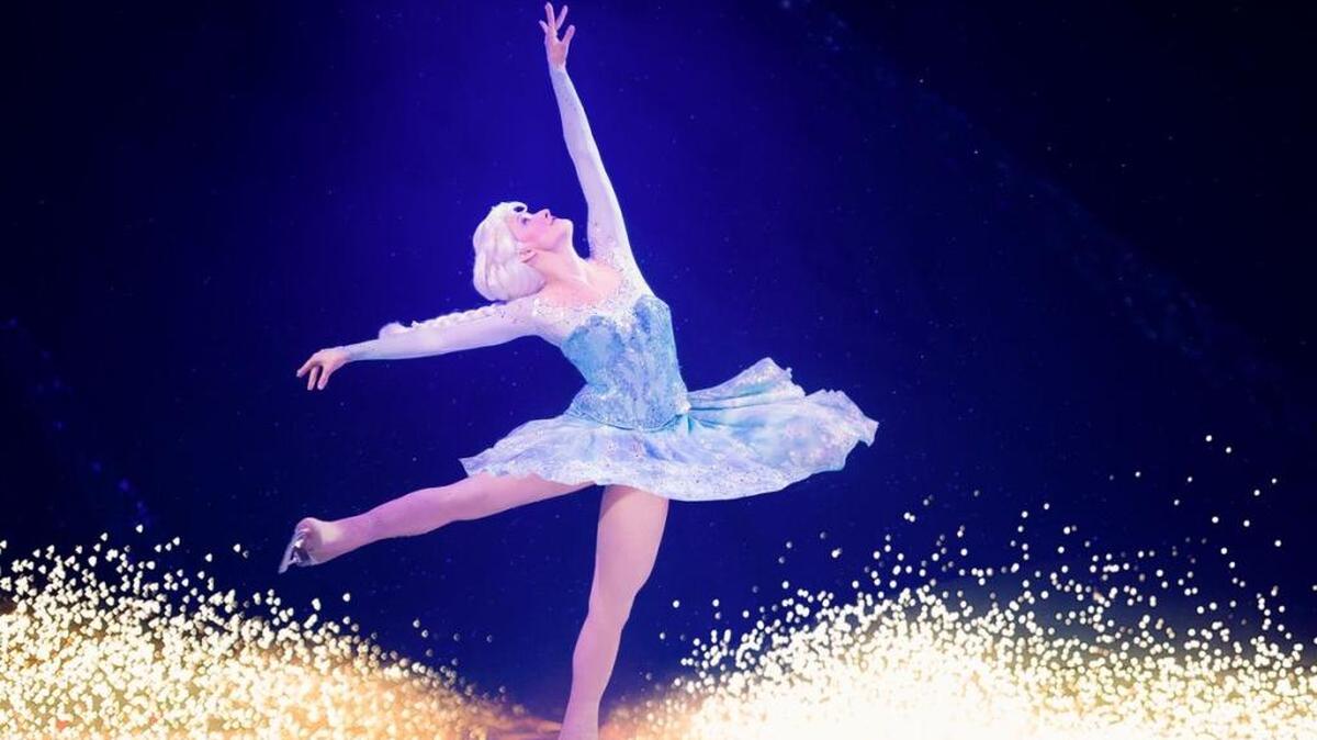 Queen Elsa pirouettes on the ice in a performance from ‘Disney on Ice Presents ‘Frozen.’