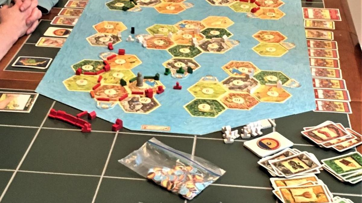 Catan, created in the 1990s in Germany, is credited with making board games again popular in America although some argue they’ve remained popular among those who prefer playing at a table with real people.