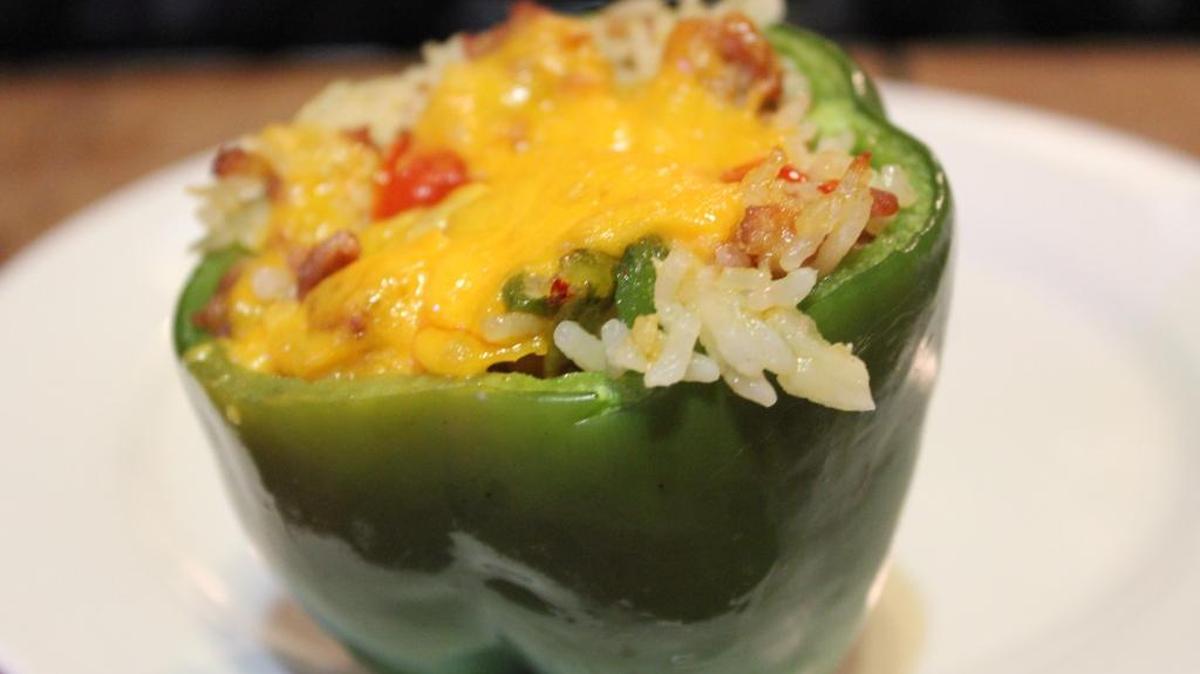 A baked stuffed bell pepper is a simple and inexpensive holiday food idea.
