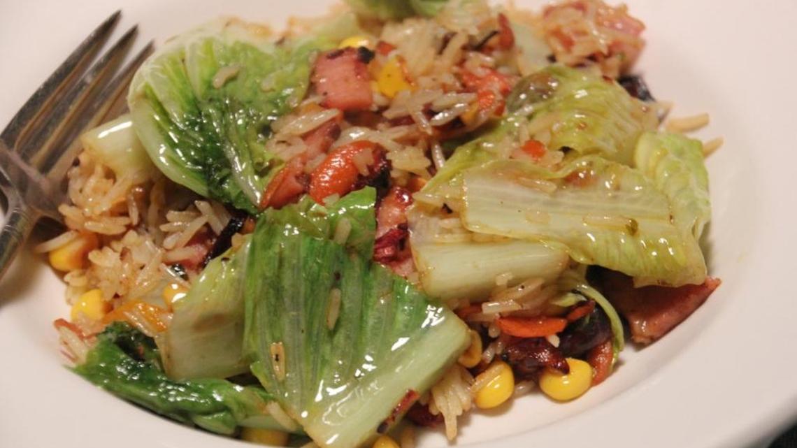 Fried rice with a few leaves of romaine lettuce is a great treat