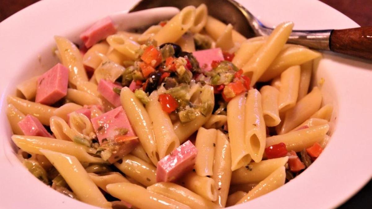Olive and mortadella pasta salad can be served warm or room temperature.