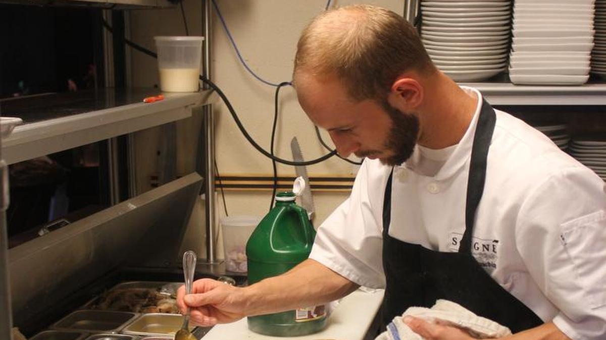 Chef Joachim at work in the kitchen at Soigne.
