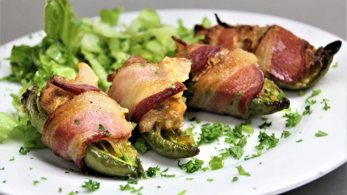 Spicy stuffed jalapeños make a great finger food.