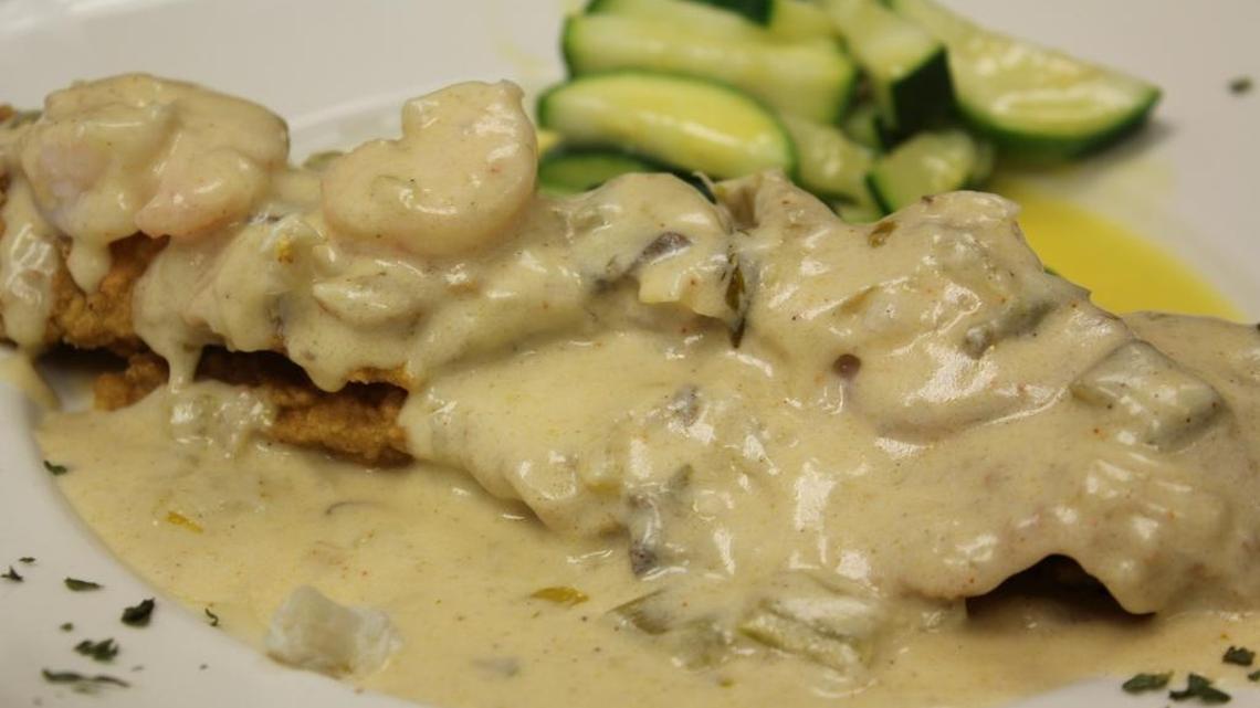 Trout in a cream sauce with shrimp and crab meat.