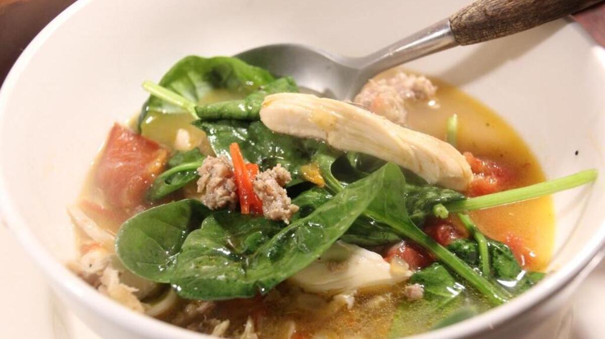 A simple stew of chicken and greens is a delicious and hearty Mardi Gras idea.