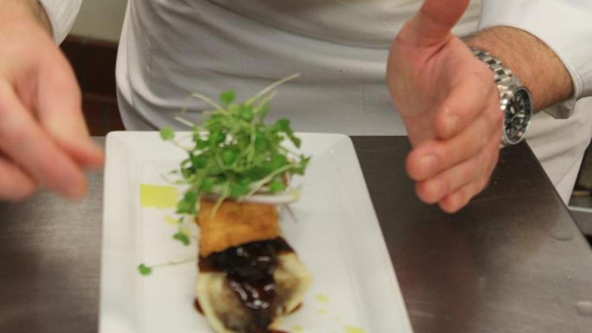 Executive Sous Chef James Balster (Beau Rivage), concentrates on plating a beautiful dish at BR Prime.