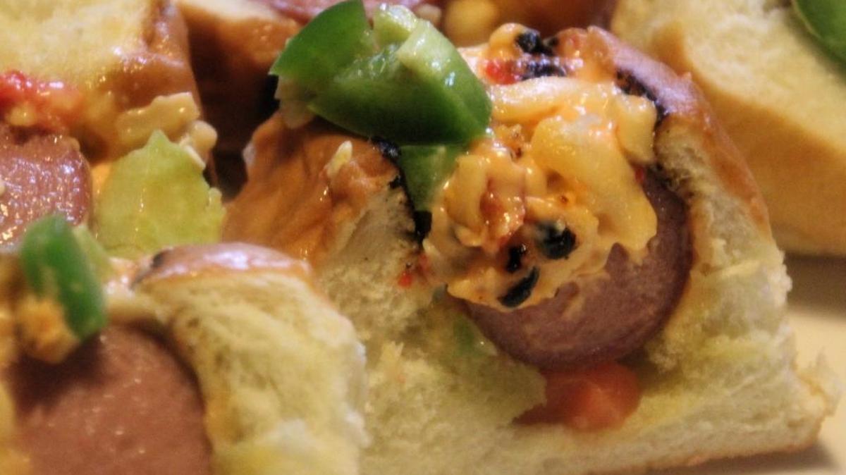 Add pimento and cheese to your hot dogs, slice and serve as an appetizer.