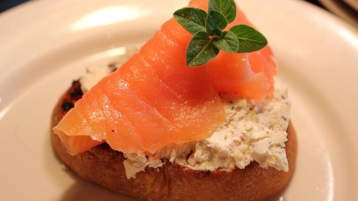 Smoked salmon can be served as a delightful crostini.