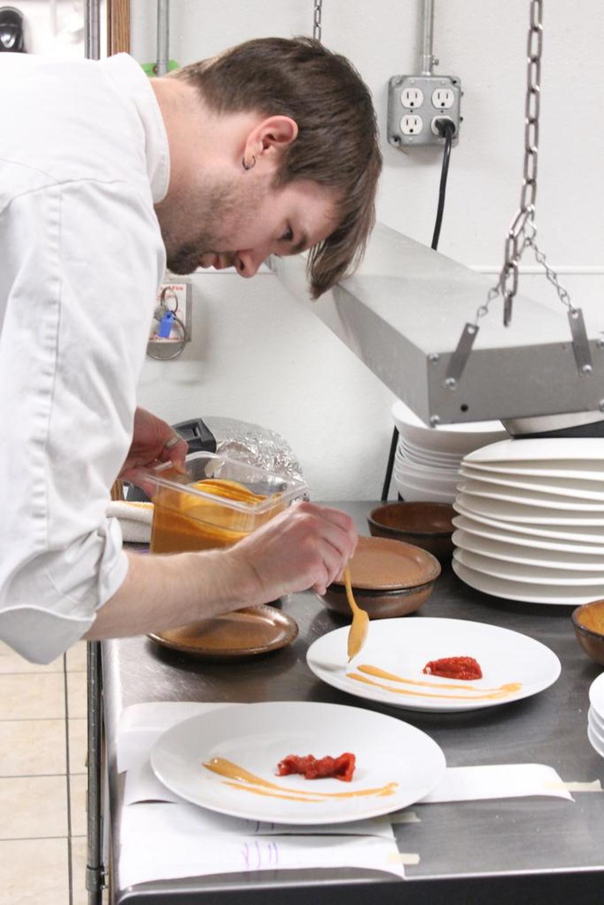 Chef Alex Perry at work in his kitchen at Vestige in Ocean Springs