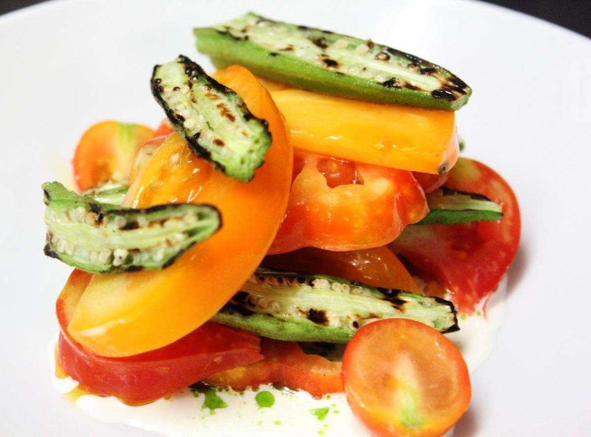 Okra and tomatoes as swerved by Chef Alex Perry of Vestige in Ocean Springs.