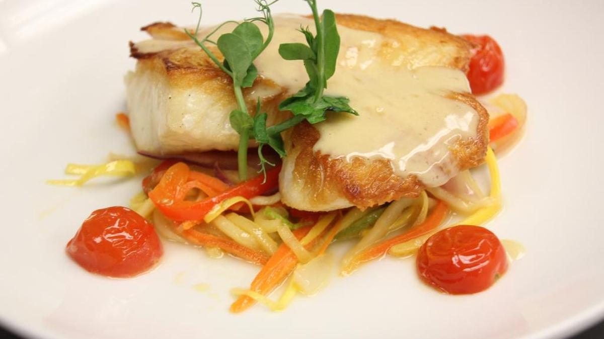 Peruvian sea bass is the centerpiece of this great example of beautiful plating.