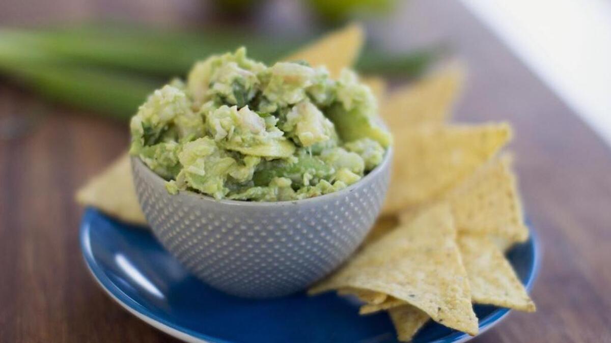 A blender makes it easy to serve up guacamole for the Super Bowl.