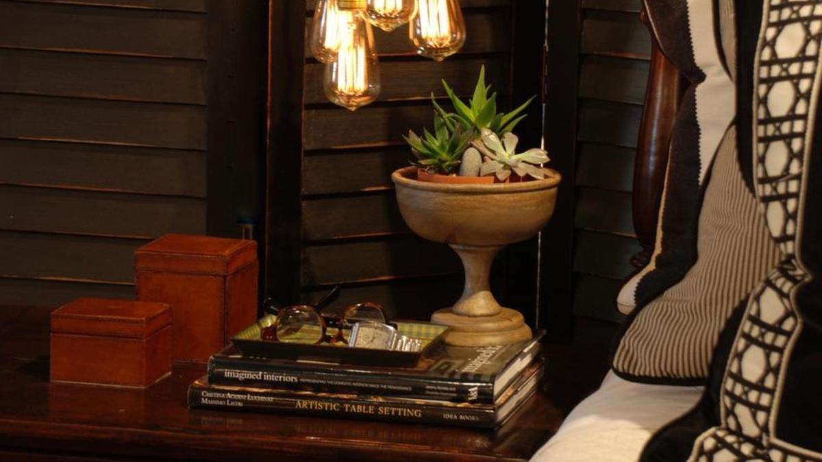 One bed-table essential is a lamp that’s bright enough to read by. This perfect white lamp, with its gold detailing, fits the bill just right.