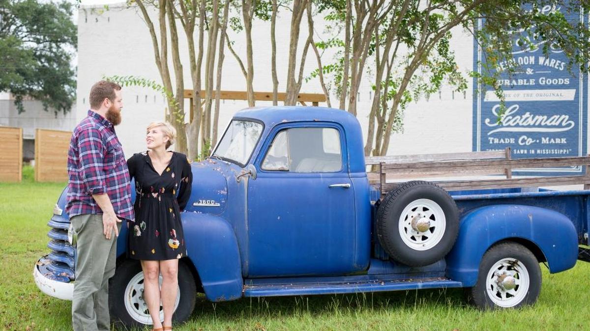Erin and Ben Napier, the stars of HGTV's "Home Town," outside their business, Laurel Merchantile Co., in Laurel, Mississippi. The couple and their town are rising stars of the cable giant focused on house makeovers.