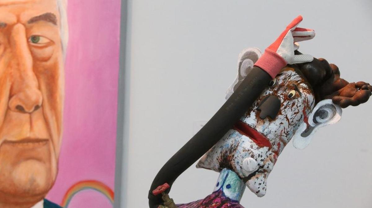 Detail from ‘The Regulator,’ right, and ‘Bob's Rainbow,’ a self-portrait, by Robert Warrens on exhibit at the Ohr-O'Keefe Museum of Art in Biloxi.