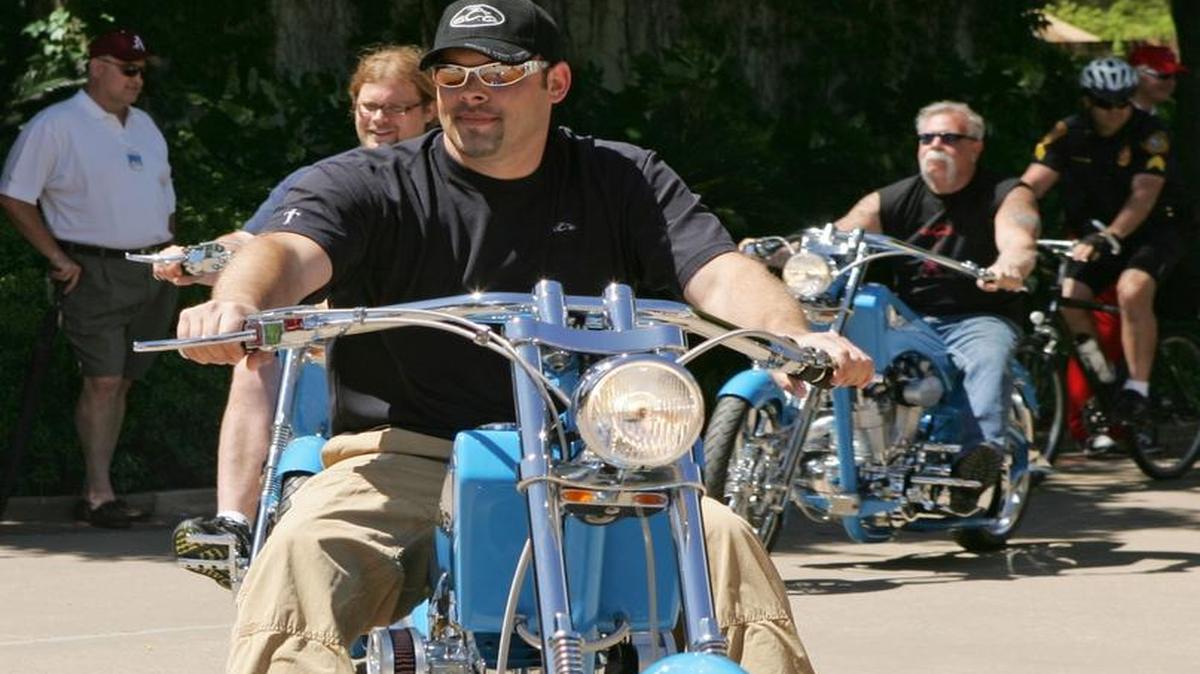 Paul Teutul Jr., of the ‘American Chopper’ television show, rides a custom-made chopper to the first tee box at the EDS Byron Nelson Championship golf tournament, Wednesday morning, April 25, 2007, in Irving, Texas.