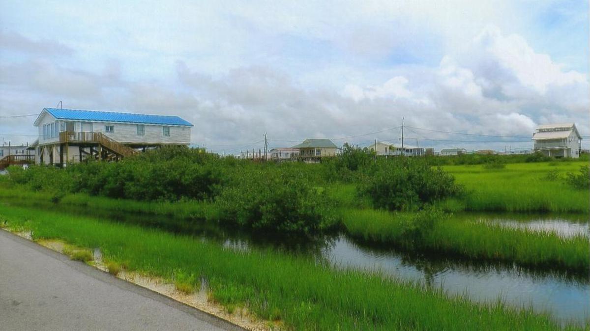 A Sunday drive to Grand Isle in Louisiana is much like a coastal drive anywhere along the Gulf, full of unexpected views and landscapes. This barrier island, for example, has an interesting array of fishing camps and marsh scenes.
