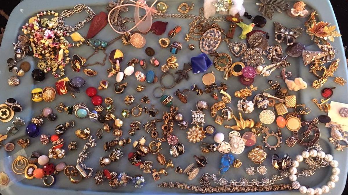 Earrings, pins, buttons and more are the basis for vintage jewelry art.