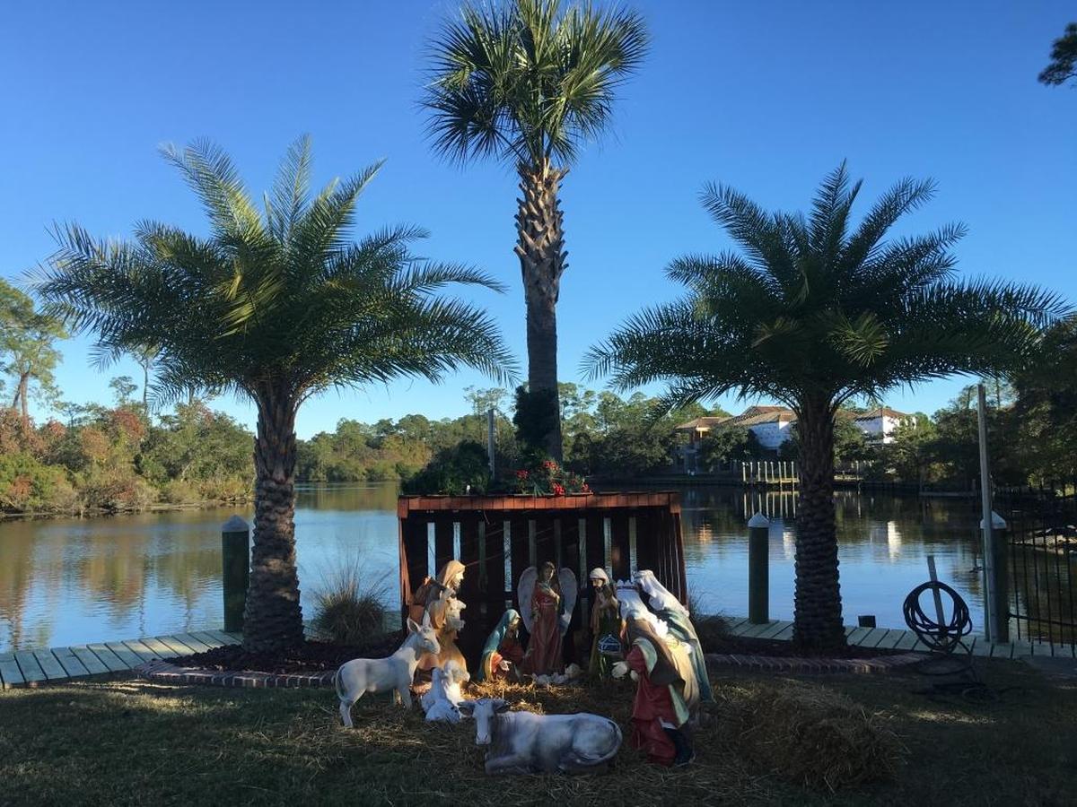 An outdoor Nativity scene greets visitors and takes on a coastal Mississippi backdrop, with Bayou Bernard in the background, at the home of Cindy and Chris Cooper in Gulfport. The home, at 22 Hancock Place, is part of the Gulfport Civic League’s 55th Tour of Homes on Dec. 4.