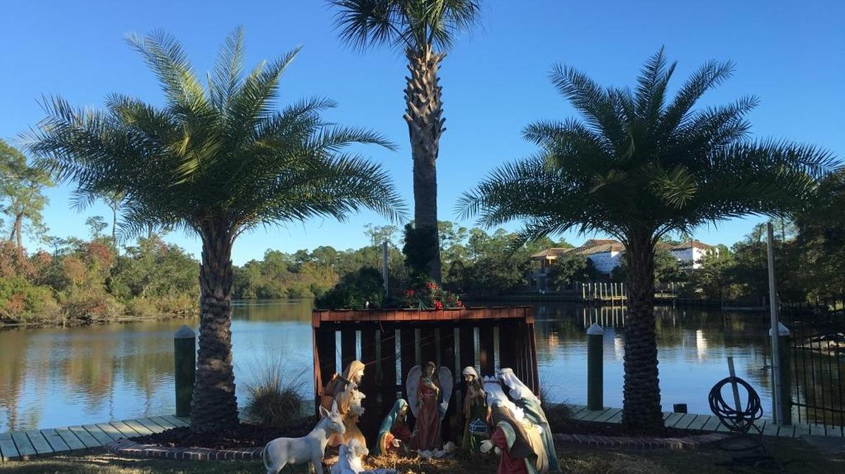 An outdoor Nativity scene greets visitors and takes on a coastal Mississippi backdrop, with Bayou Bernard in the background, at the home of Cindy and Chris Cooper in Gulfport. The home, at 22 Hancock Place, is part of the Gulfport Civic League’s 55th Tour of Homes on Dec. 4.