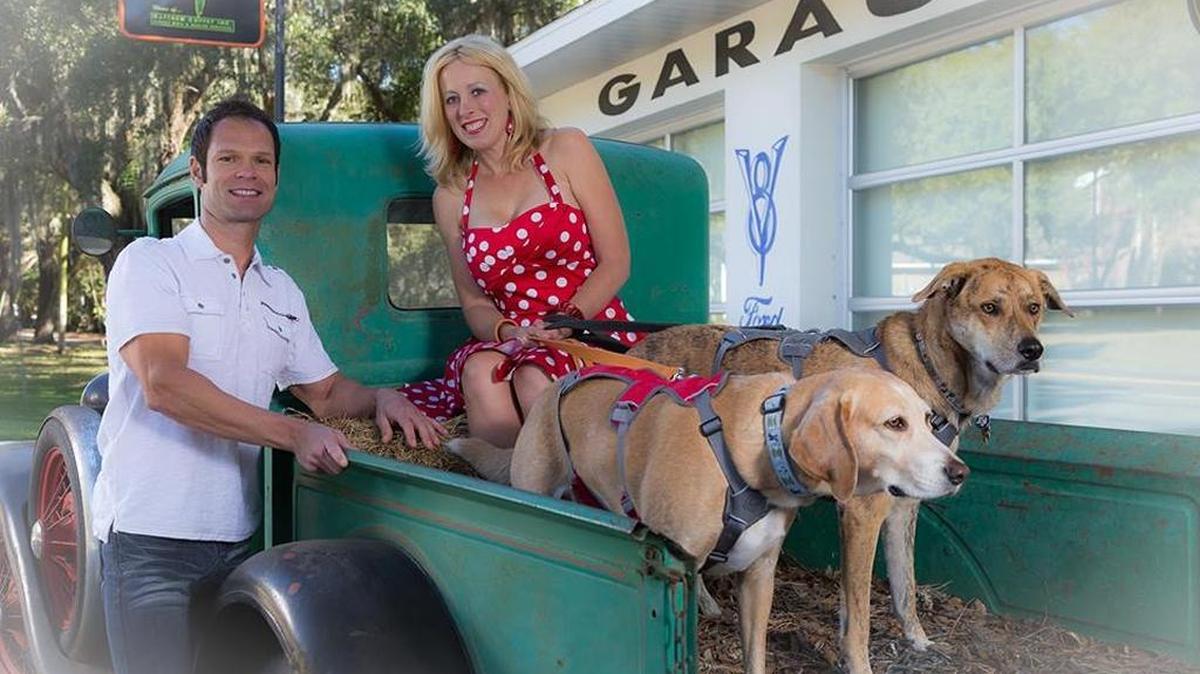 Rachael and Nathan Johnson with their dogs, Digby Pancake and Peanut Butter Brickle.