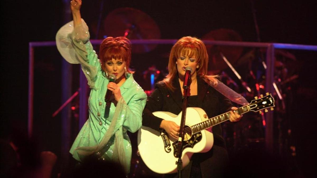 Naomi and Wynonna Judd perform in April 2000. Between 1985 and 1992, The Judds would take home the Grammy for Best Country Performance by a Duo or Group with Vocal five times.