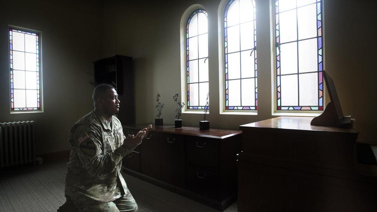 Army Lt. Col. Khallid Shabazz prays five time a day as an Islamic chaplain at the Main Post Chapel on JBLM on Wednesday, Feb. 22, 2017.