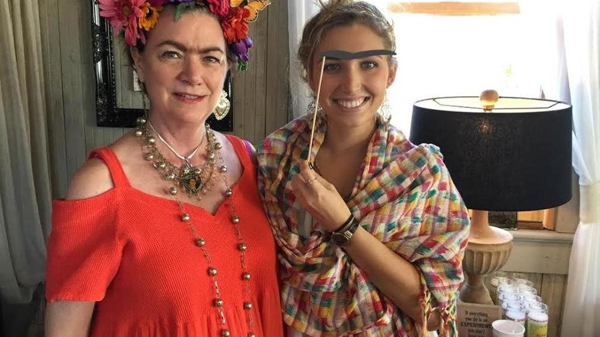 Brenda Comer and Rebecca Lacoste get into the spirit of Frida Fest on Saturday, June 11, 2016.